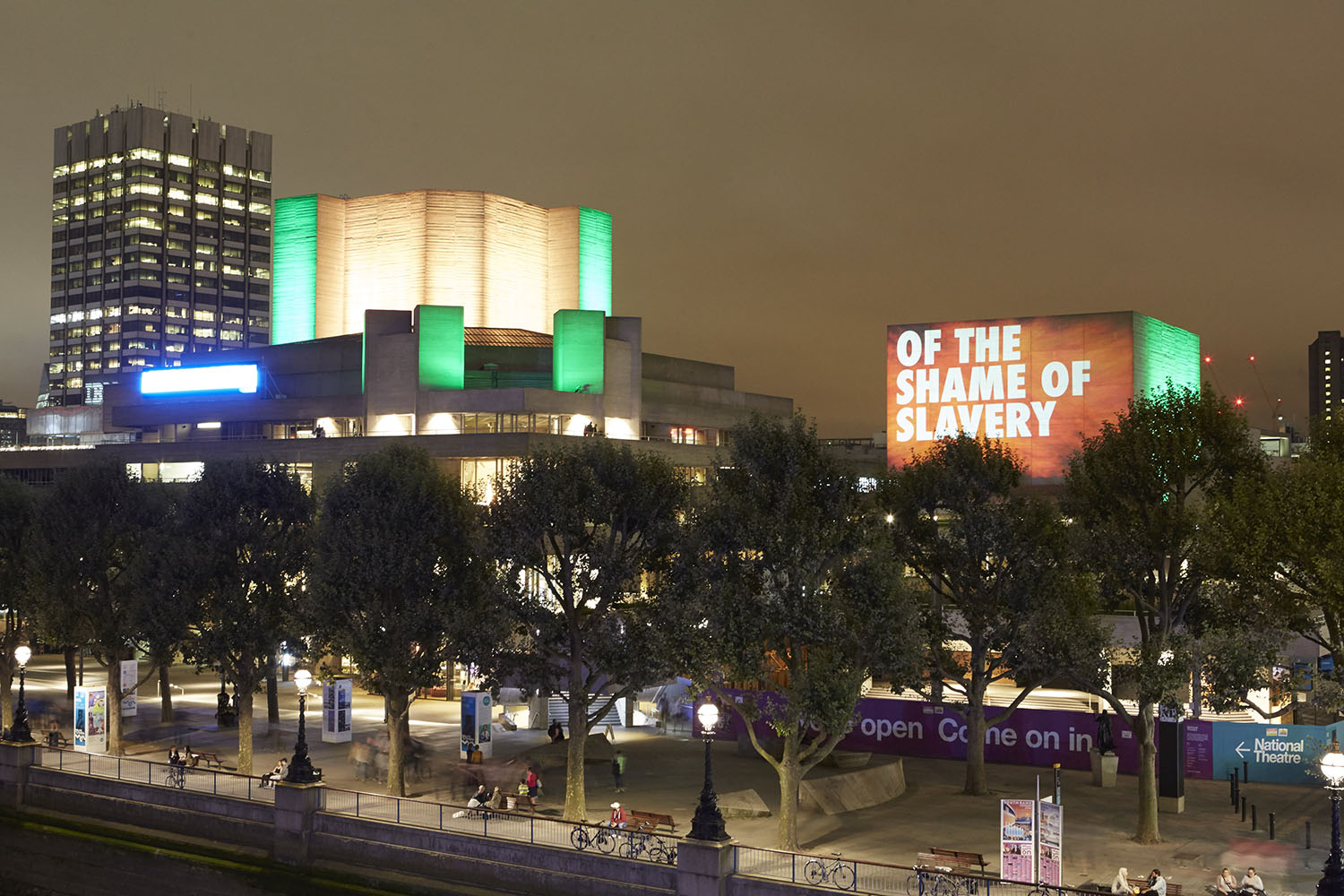 The flytower of the National Theatre in London with the words 
