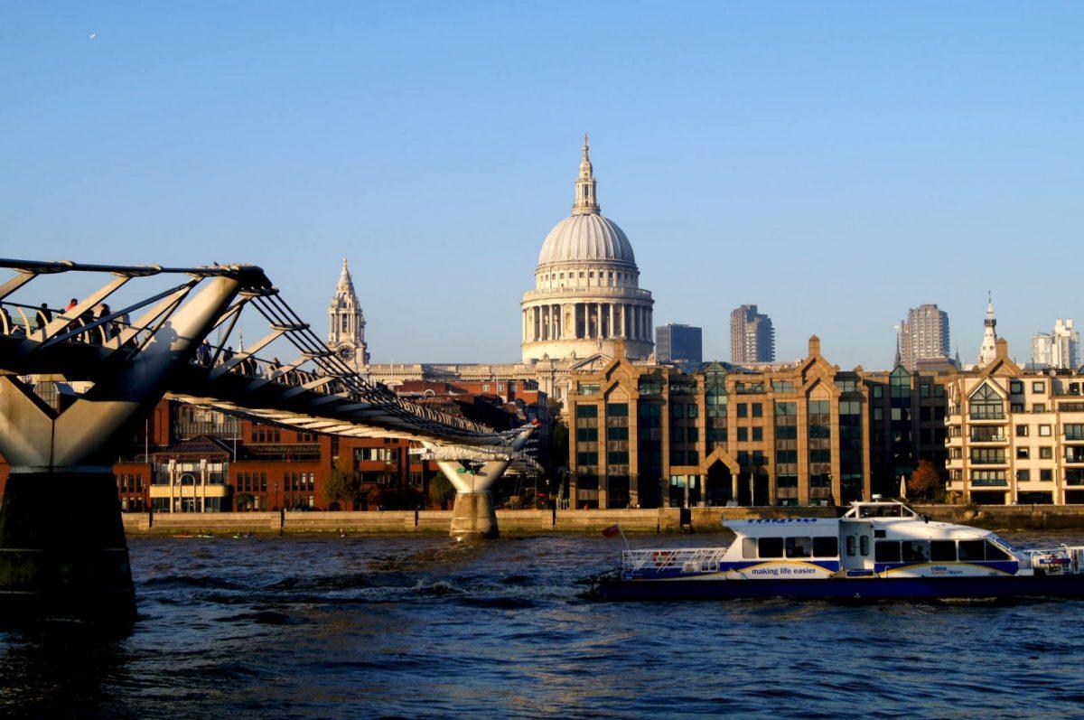 Via of St Paul's Cathedral across the river on a bright day in central London,