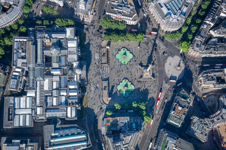 Photo of the streets of London taken from overhead in a helicopter.