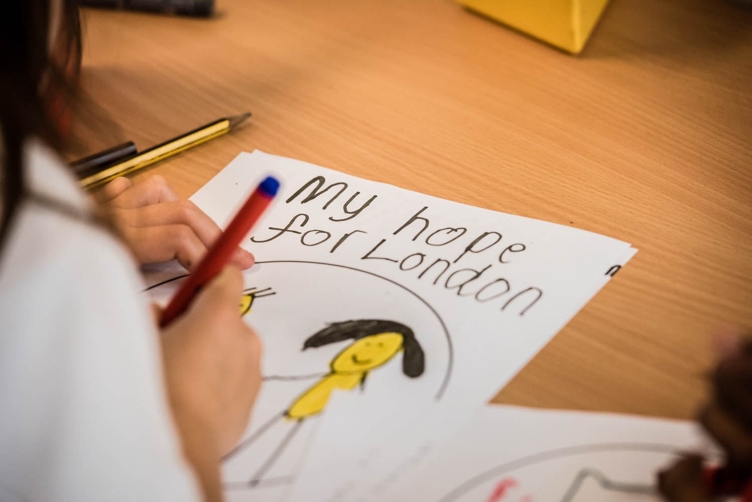 A child's writing on a piece of paper. Text reads: 'My hope for London'.