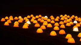 Peace Camp at Dunstanburgh Castle, Northumberland at night