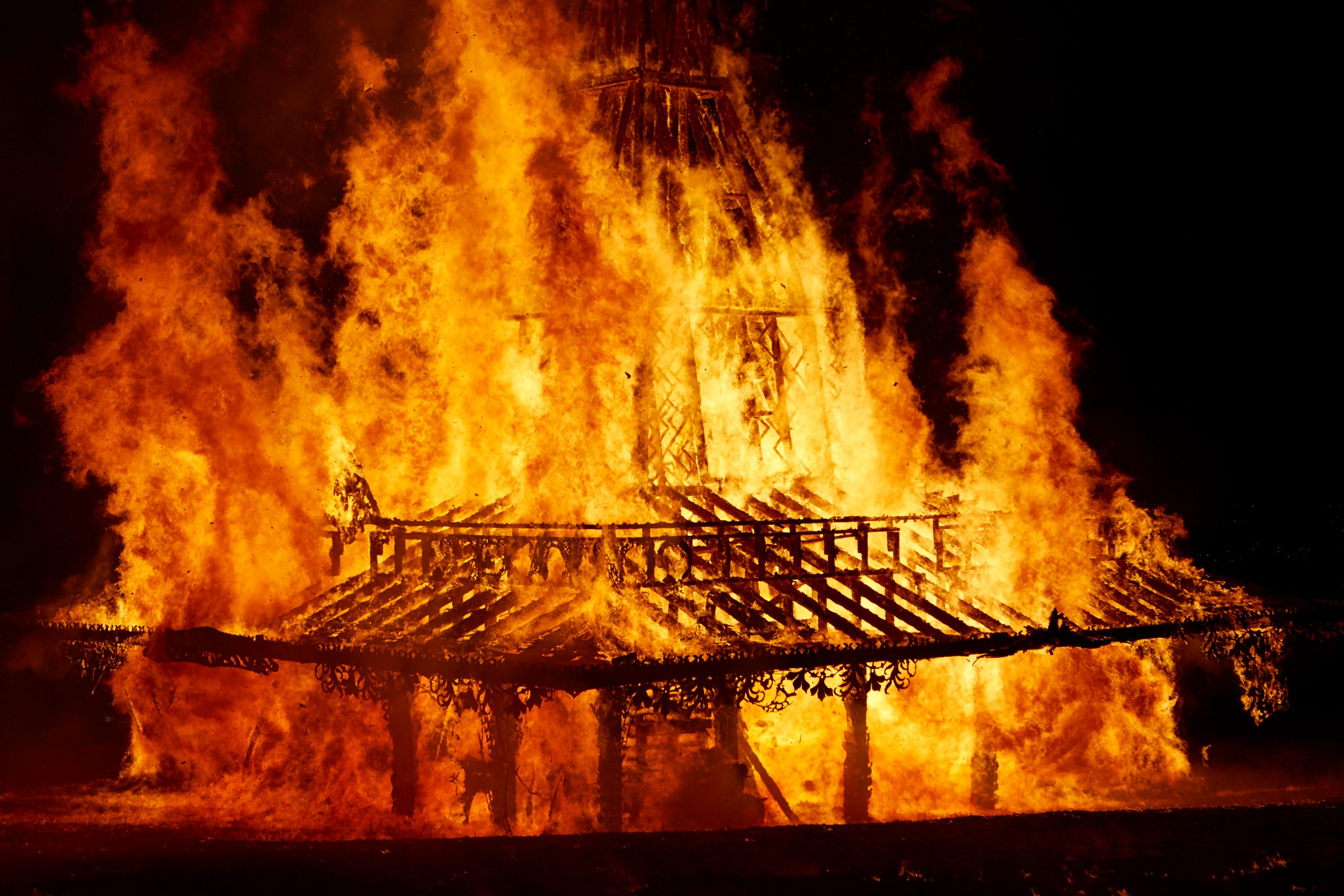 Close up of the Temple structure engulfed in flames