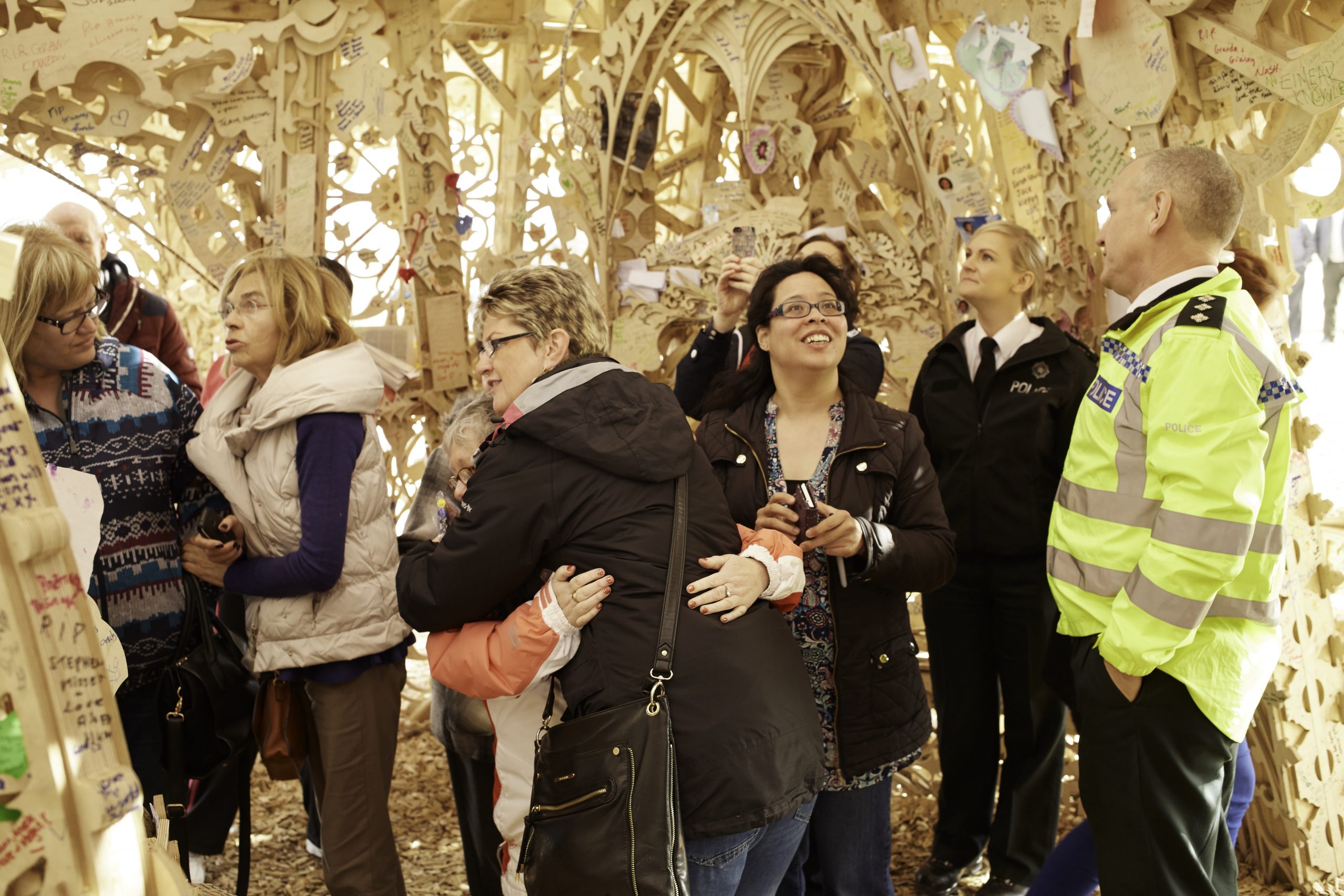 People inside the temple structure looking around