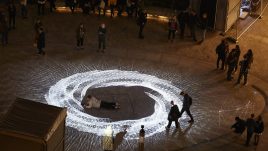 Light installation Hidden Voices: PROCESSIONS in the City at night in Aldgate Square