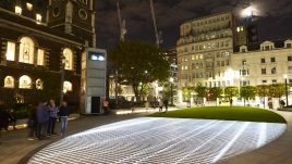 Light installation Hidden Voices: PROCESSIONS in the City at night in Aldgate Square