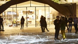 Light installation Hidden Voices: PROCESSIONS in the City at night in Aldgate Square