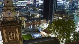 Light installation Hidden Voices: PROCESSIONS in the City at night in Aldgate Square