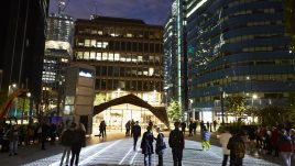 Light installation Hidden Voices: PROCESSIONS in the City at night in Aldgate Square