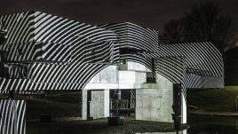 Apollo Pavilion illuminated in striped circular monochrome light