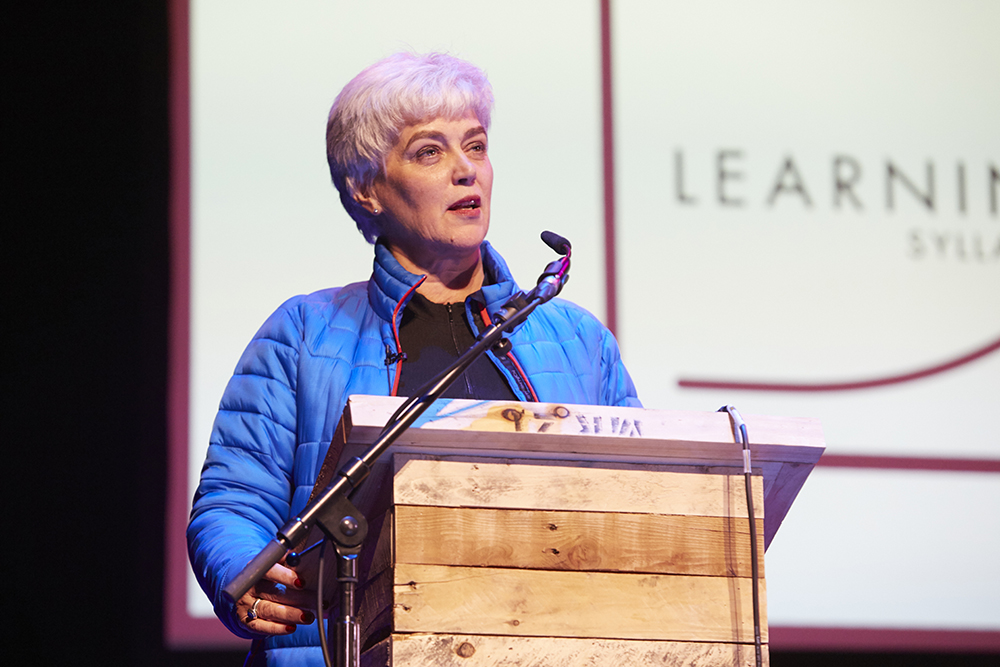 Helen Marriage giving a talk at the Lumiere conference, 2019