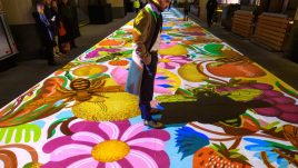 Passers-by interacting with Imminence at Bloomberg Arcade.