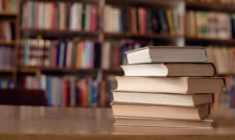 Stack of books on a table.