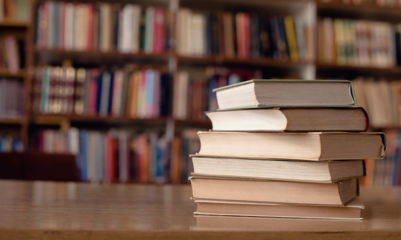 Books. Photo owned by Getty Images. Stack of books on a table.