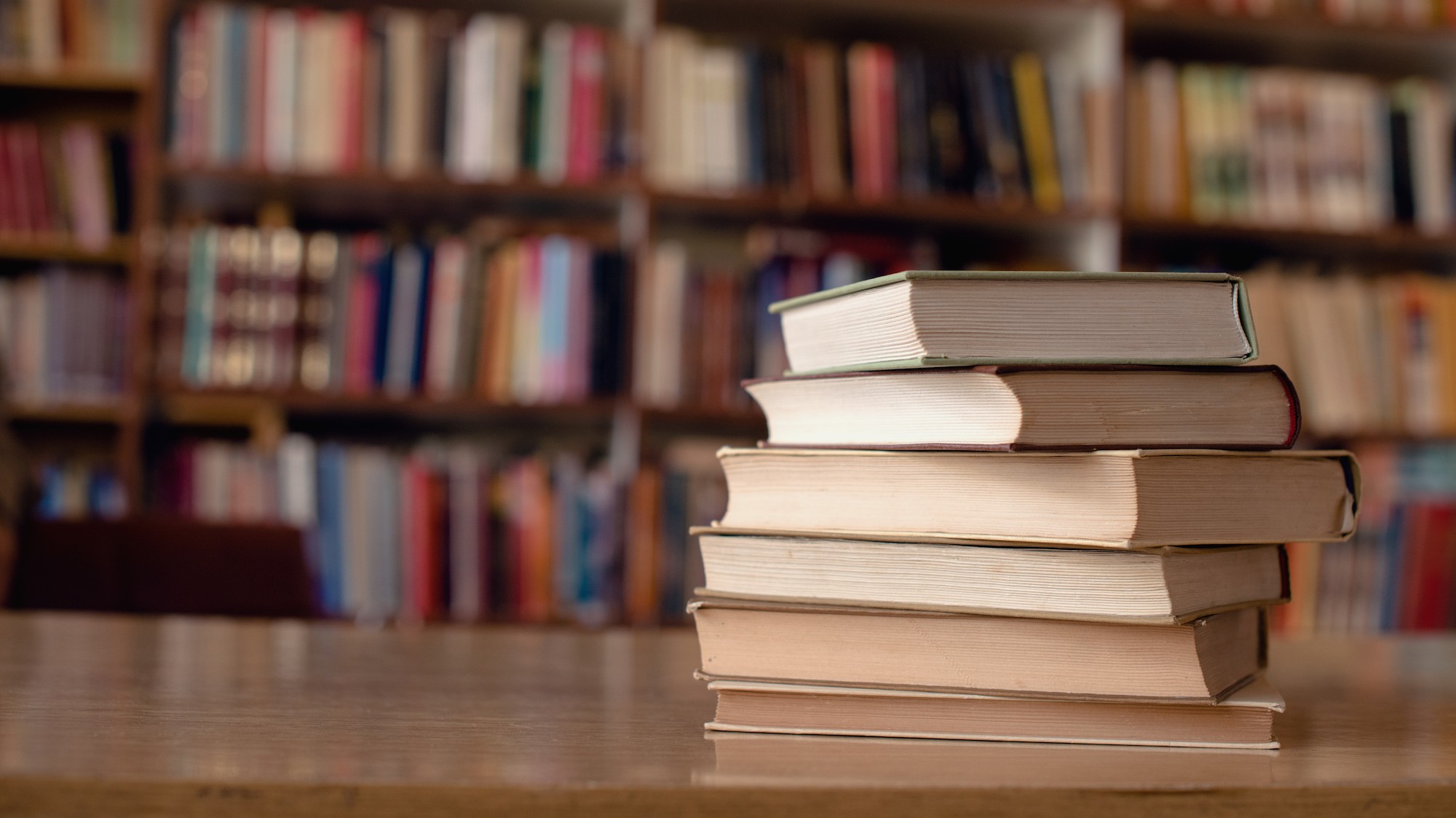 Stack of books on a table.