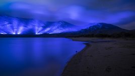 An emerald and blue light roof over the Connemara mountains valley