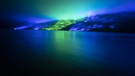 An emerald and blue light roof over the Connemara mountains valley