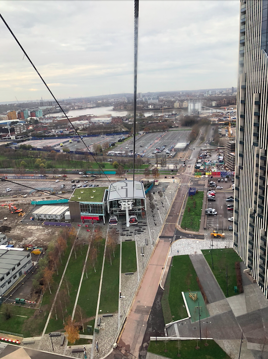 View from the Emirates Airline, looking down at other carriages behind