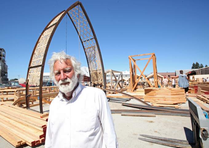 Artist, David Best standing in front of the Temple construction site.