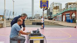 Sound engineers on the basketball court