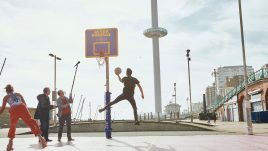 John and Mike Furness recording sounds on the basketball court