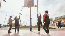 John and Mike Furness recording sounds on the basketball court