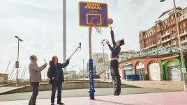 John and Mike Furness recording sounds on the basketball court