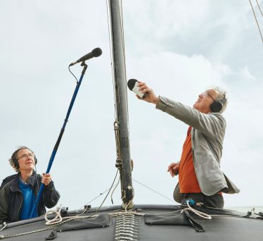 John Del' Nero and Mike Furness recording dinghies.