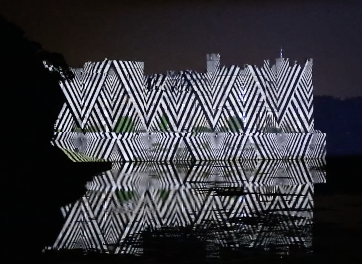 Raby Castle with a black and white zigzag projection over it