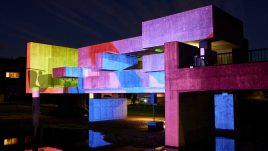 Apollo 50 bridge lit up with a colour projection