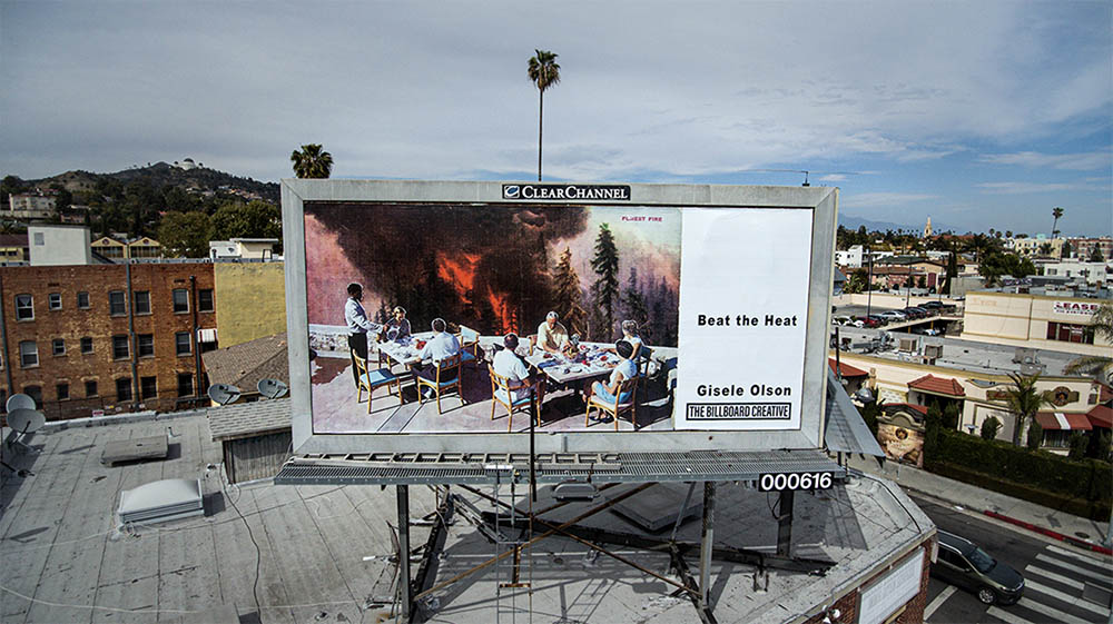 A billbosrd showing a painting pf people sitting at a table. Text reads 'Beat the heat'