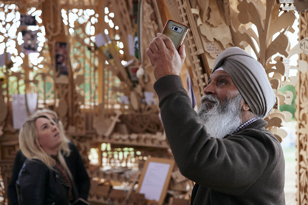 A man taking a photograph inside Sanctuary