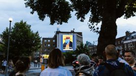 Photo of art by Stevexoh on a billboard; Cartoon colourful cowboy looking sad with the words 