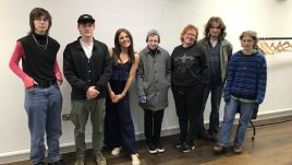 A workshop in Belfast for Season 2 of The Gallery. All of the participants stand lined up for a photo.