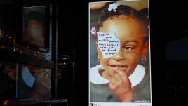 An image of a bus stop digital screen showing the artwork ‘Does This Answer Your Question’ (2023) by Yasmin Nicholas.