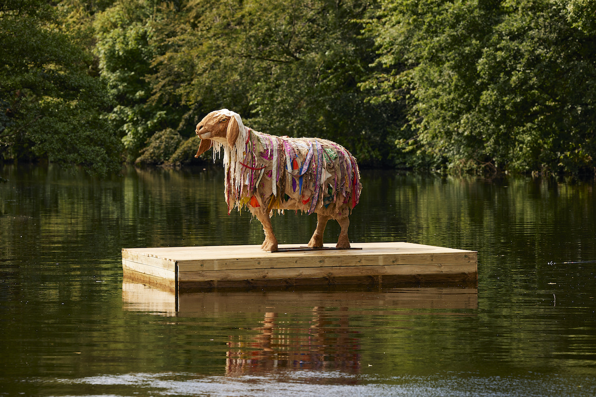 Hant, one of the HERD sheep sculptures, on a floating dock.